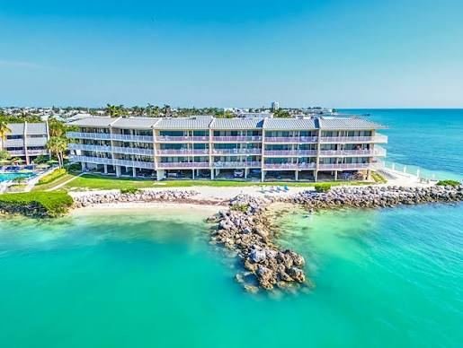 Waterfront condo building on Key Colony Beach, Florida Keys, an area served by Cleaning Services GM